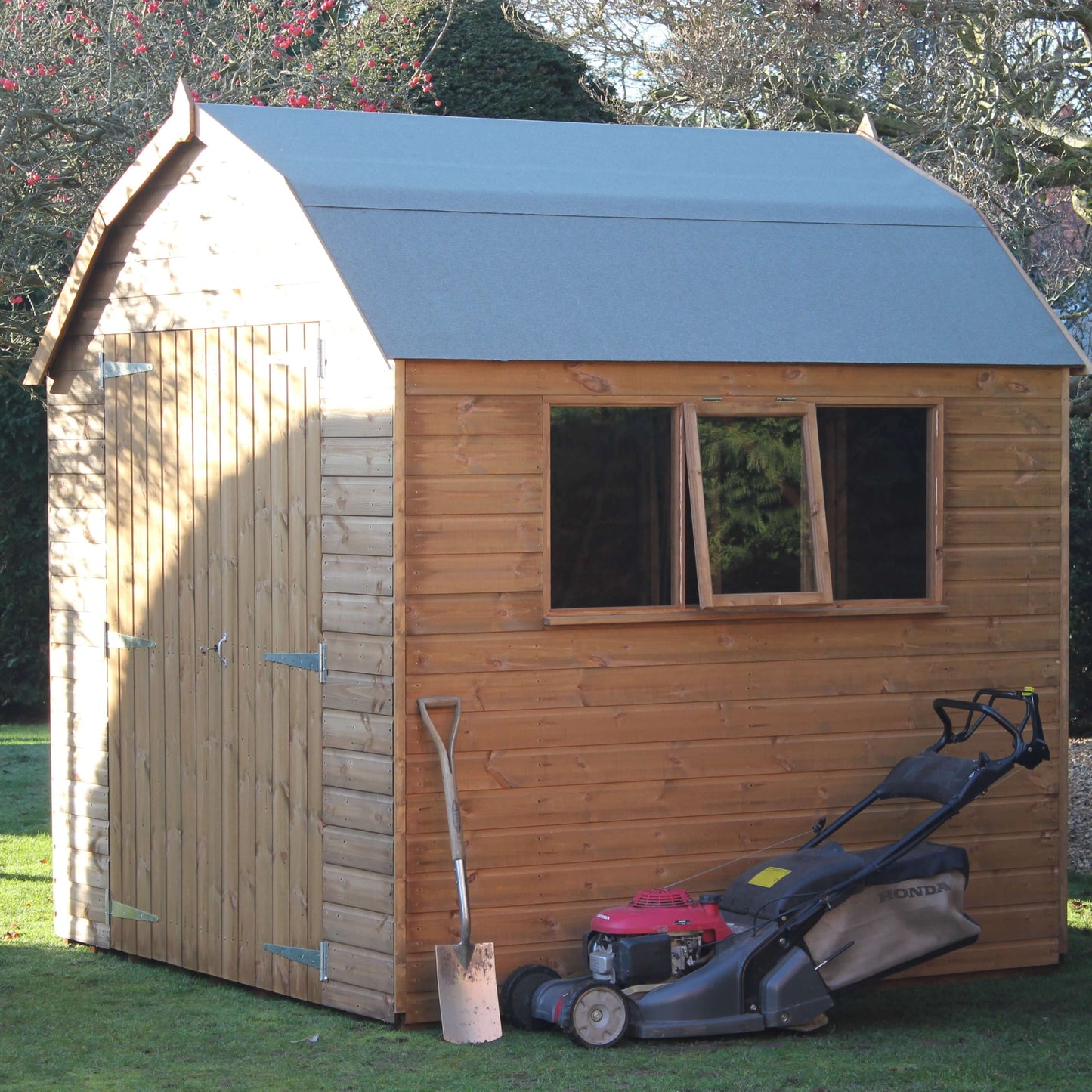 dutch barn shed with mower