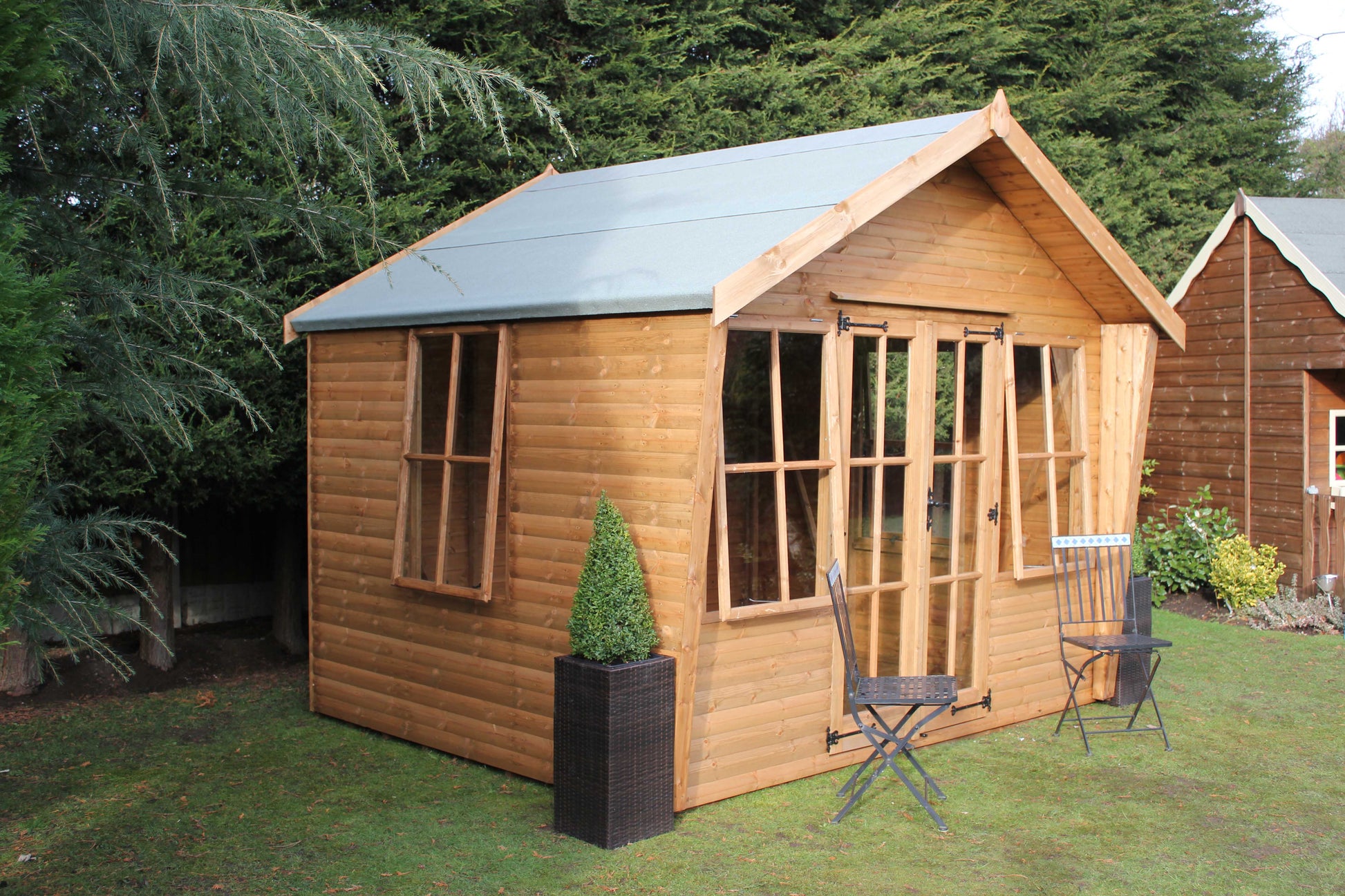 Alpine Wing Summer House Corner View with Chairs