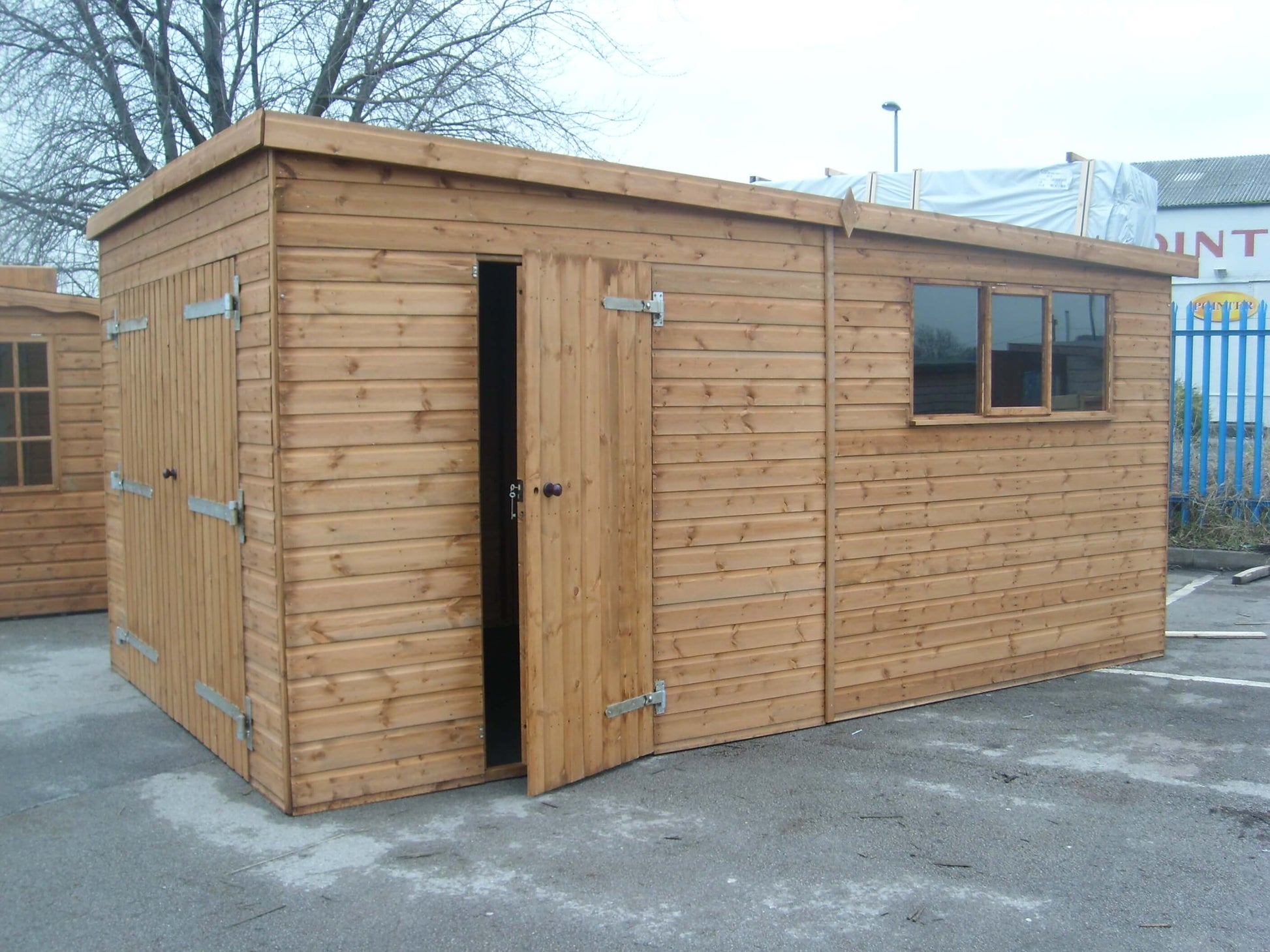 Timber garage shed with a Pent roof